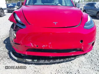 2022 Tesla Model Y Long Range with VIN 7SAYGDEE7NF549278, listed as a IAAI auction lot 42072801 with 39,374 mi miles and . Bid and sale history available at carsss.com. Image 6.