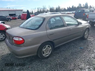 2001 Kia Sephia z VIN KNAFB121815046919, wystawiony jako IAAI lot #41398257 z przebiegiem 191 818 mil mil oraz . Historia ofert i sprzedaży dostępna na DreamBid. Obrazek 4.