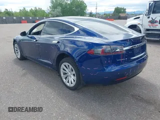 2016 Tesla Model S 70 with VIN 5YJSA1E18GF174200, listed as a IAAI auction lot 42274415 with 65,231 mi miles and . Bid and sale history available at DreamBid. Image 3.