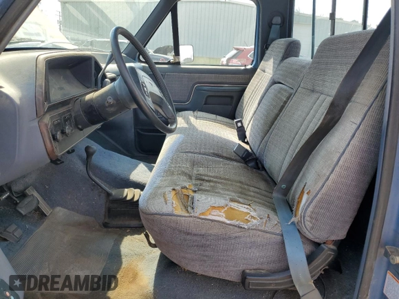 1990 Ford F-150 with VIN 1FTEF14N6LNB21235, listed as a Copart auction lot 46149815 with 76,777 mi miles and Salvage Title. Bid and sale history available at carsss.com. Image 7.