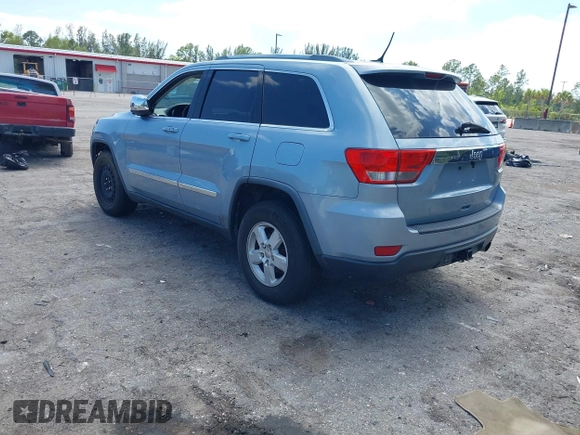 2013 Jeep Grand Cherokee Laredo with VIN 1C4RJEAG2DC517303, listed as a IAAI auction lot 42040405 with 222,952 mi miles. Bid and sale history available at carsss.com. Image 3.