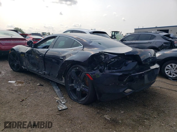 2012 Fisker Karma EcoChic z VIN YH4K16AA7CA000341, wystawiony jako Copart lot #62492854 z przebiegiem Nie podano mil oraz Szkody całkowita. Historia ofert i sprzedaży dostępna na DreamBid. Obrazek 2.