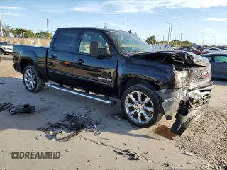 2010 GMC Sierra 1500 SLT with VIN 3GTRCWE03AG287390, listed as a Copart auction lot 87533655 with 163,253 mi miles and Salvage title. Bid and sale history available at DreamBid. Image 4.