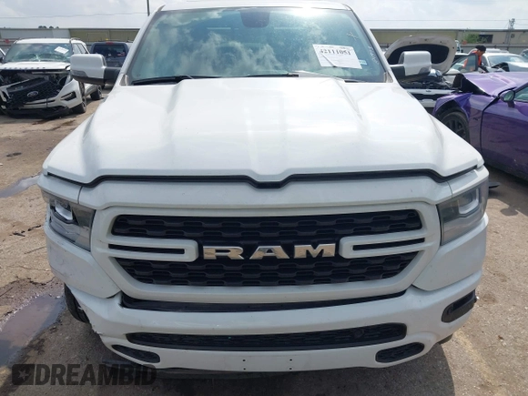 2023 Ram 1500 Big Horn with VIN 1C6SRFFT4PN532343, listed as a IAAI auction lot 42111051 with 15,079 mi miles and . Bid and sale history available at DreamBid. Image 12.