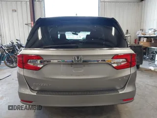 2018 Honda Odyssey EX-L z VIN 5FNRL6H70JB059653, wystawiony jako IAAI lot #42324330 z przebiegiem 115 623 mil mil oraz . Historia ofert i sprzedaży dostępna na DreamBid. Obrazek 17.