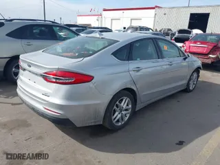 2019 Ford Fusion Hybrid SE with VIN 3FA6P0LU5KR140266, listed as a IAAI auction lot 41703313 with 1 mi miles. Bid and sale history available at carsss.com. Image 4.