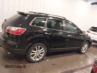 2011 Mazda CX-9 Grand Touring z VIN JM3TB3DA8B0329437, wystawiony jako IAAI lot #42243017 z przebiegiem 250 572 mil mil oraz . Historia ofert i sprzedaży dostępna na DreamBid. Obrazek 14.