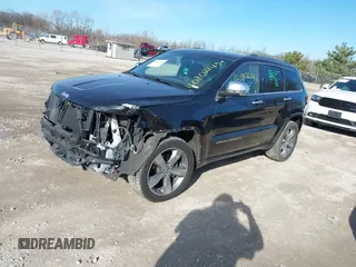2014 Jeep Grand Cherokee Overland with VIN 1C4RJECG4EC523747, listed as a IAAI auction lot 40802143 with 124,079 mi miles. Bid and sale history available at carsss.com. Image 19.