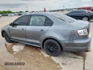 2014 Volkswagen Jetta S with VIN 3VW2K7AJ4EM226580, listed as a Copart auction lot 58539055 with 138,927 mi miles and Salvage title. Bid and sale history available at DreamBid. Image 2.