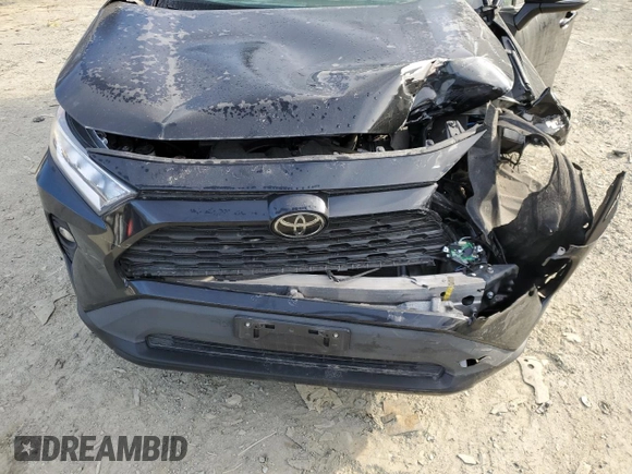 2020 Toyota RAV4 XLE with VIN 2T3P1RFV6LC101399, listed as a Copart auction lot 48256825 with 58,966 mi miles and Salvage Title. Bid and sale history available at DreamBid. Image 14.