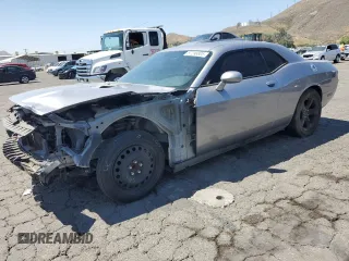 2013 Dodge Challenger SXT z VIN 2C3CDYAG2DH616154, wystawiony jako Copart lot #57296805 z przebiegiem 86 982 mil mil oraz Tytuł czysty. Historia ofert i sprzedaży dostępna na DreamBid. Obrazek 1.