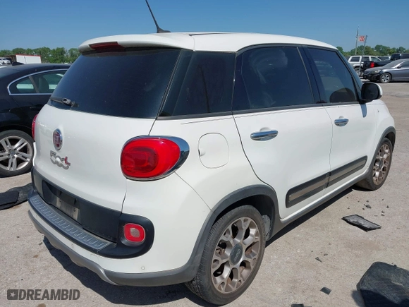 2014 FIAT 500L Trekking with VIN ZFBCFADH2EZ007586, listed as a IAAI auction lot 42040589 with 69,793 mi miles. Bid and sale history available at carsss.com. Image 4.