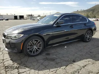2020 BMW 3 Series 330i with VIN WBA5R1C02LFH42057, listed as a Copart auction lot 47142865 with 200,121 mi miles and Clean Title. Bid and sale history available at carsss.com. Image 1.