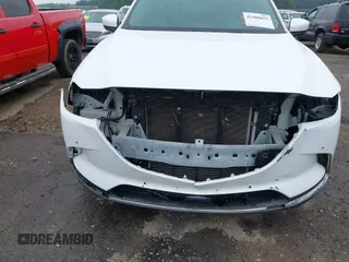2021 Mazda CX-9 Signature with VIN JM3TCBEY4M0517118, listed as a IAAI auction lot 42400675 with 56,260 mi miles and . Bid and sale history available at DreamBid. Image 6.