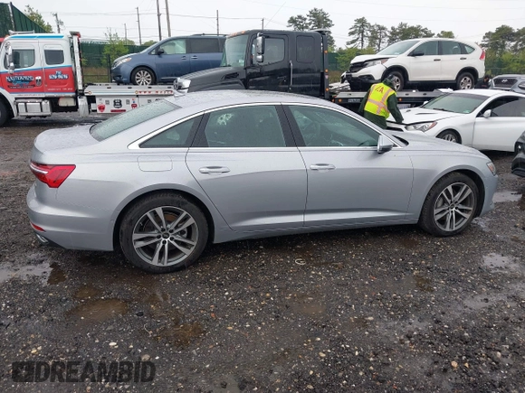 2023 Audi A6 Premium z VIN WAUD3BF27PN068058, wystawiony jako IAAI lot #42179522 z przebiegiem 7 869 mil mil oraz . Historia ofert i sprzedaży dostępna na DreamBid. Obrazek 13.