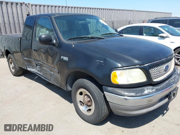 2003 Ford F-150 XL with VIN 1FTRX17213NB70553, listed as a IAAI auction lot 41946968 with 186,683 mi miles. Bid and sale history available at carsss.com. Image 12.