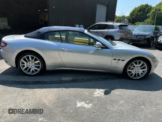 2010 Maserati GranTurismo z VIN ZAM45KMA2A0051367, wystawiony jako Copart lot #66652475 z przebiegiem 43 225 mil mil oraz Czysty tytuł • Clean title. Historia ofert i sprzedaży dostępna na DreamBid. Obrazek 11.
