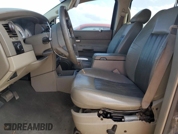 2004 Dodge Durango Limited z VIN 1D8HB58D74F122229, wystawiony jako Copart lot #43991385 z przebiegiem Nie podano mil oraz Szkoda całkowita • Salvage title. Historia ofert i sprzedaży dostępna na DreamBid. Obrazek 7.