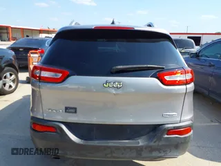 2014 Jeep Cherokee Latitude with VIN 1C4PJMCB4EW315520, listed as a IAAI auction lot 42034989 with 215,758 mi miles and . Bid and sale history available at DreamBid. Image 6.