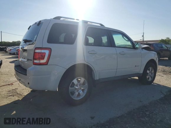 2010 Ford Escape Hybrid with VIN 1FMCU4K38AKB79549, listed as a Copart auction lot 57293035 with 83,742 mi miles and Salvage title. Bid and sale history available at DreamBid. Image 3.