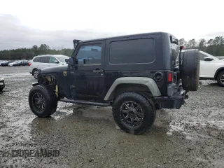 2009 Jeep Wrangler X with VIN 1J4FA241X9L735743, listed as a Copart auction lot 48109455 with 232,110 mi miles and Salvage Title. Bid and sale history available at DreamBid. Image 2.