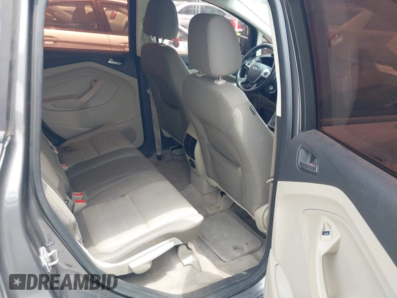 2013 Ford C-Max SE z VIN 1FADP5AU8DL556966, wystawiony jako IAAI lot #42420493 z przebiegiem 70 719 mil mil oraz . Historia ofert i sprzedaży dostępna na DreamBid. Obrazek 8.