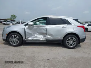 2017 Cadillac XT5 Luxury FWD z VIN 1GYKNBRS0HZ109439, wystawiony jako IAAI lot #42063044 z przebiegiem 79 851 mil mil oraz . Historia ofert i sprzedaży dostępna na DreamBid. Obrazek 14.