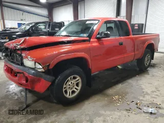 2002 Dodge Dakota z VIN 1B7GG32XX2S510126, wystawiony jako Copart lot #80562074 z przebiegiem 121 890 mil mil oraz Szkoda całkowita • Salvage title. Historia ofert i sprzedaży dostępna na DreamBid. Obrazek 1.