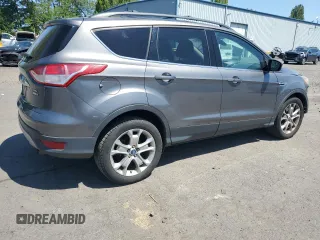 2013 Ford Escape SEL with VIN 1FMCU9HX1DUC79086, listed as a Copart auction lot 57312515 with 124,928 mi miles and Salvage title. Bid and sale history available at DreamBid. Image 3.