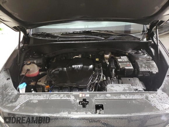 2022 Hyundai Santa Fe SEL z VIN 5NMS3DAJ1NH461911, wystawiony jako Copart lot #48126595 z przebiegiem 53 669 mil mil oraz Szkoda całkowita • Salvage title. Historia ofert i sprzedaży dostępna na DreamBid. Obrazek 13.