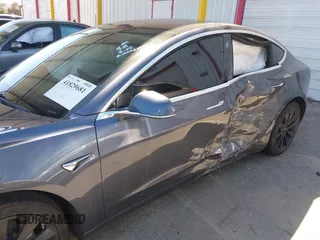 2018 Tesla Model 3 Long Range Battery with VIN 5YJ3E1EA7JF163401, listed as a IAAI auction lot 41829681 with 90,065 mi miles. Bid and sale history available at carsss.com. Image 6.