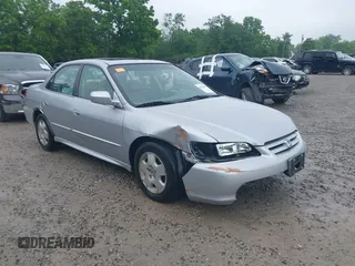 2002 Honda Accord EX z VIN 1HGCG16562A082297, wystawiony jako IAAI lot #42439696 z przebiegiem 230 969 mil mil oraz . Historia ofert i sprzedaży dostępna na DreamBid. Obrazek 1.