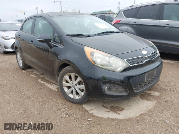 2013 Kia Rio SX with VIN KNADN5A36D6245572, listed as a IAAI auction lot 42182188 with 205,142 mi miles and . Bid and sale history available at DreamBid. Image 1.