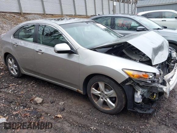 2010 Acura TSX with VIN JH4CU2F64AC031288, listed as a IAAI auction lot 42023406 with 144,192 mi miles. Bid and sale history available at carsss.com. Image 1.