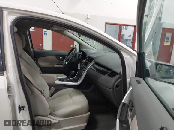 2013 Ford Edge SE z VIN 2FMDK3GC2DBC66486, wystawiony jako IAAI lot #42630850 z przebiegiem 133 750 mil mil oraz . Historia ofert i sprzedaży dostępna na DreamBid. Obrazek 5.