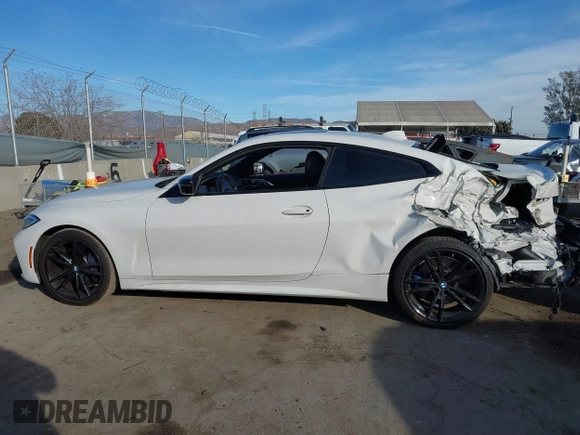 2021 BMW 4 Series M440i xDrive with VIN WBA13AR09MCF64044, listed as a IAAI auction lot 41391508 with 29,007 mi miles and . Bid and sale history available at DreamBid. Image 14.
