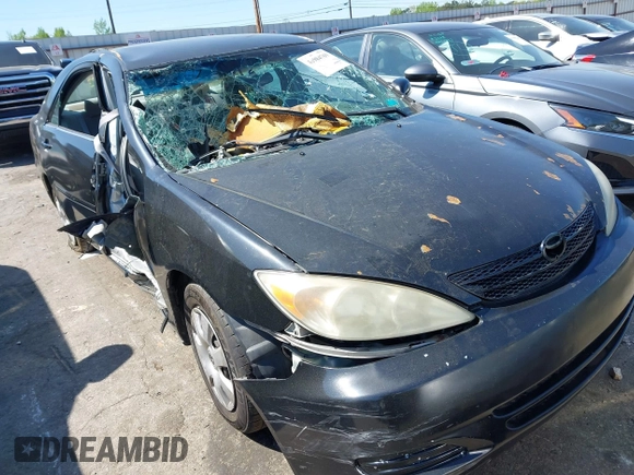 2004 Toyota Camry LE with VIN 4T1BE32K54U270040, listed as a IAAI auction lot 41984769 with Not provided miles and . Bid and sale history available at DreamBid. Image 1.
