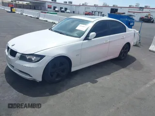 2007 BMW 3 Series 328i with VIN WBAVC53537FZ81155, listed as a IAAI auction lot 42368057 with 134,870 mi miles and . Bid and sale history available at DreamBid. Image 2.