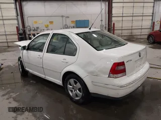 2004 Volkswagen Jetta GLS z VIN 3VWSK69MX4M078023, wystawiony jako IAAI lot #41198138 z przebiegiem 153 830 mil mil oraz . Historia ofert i sprzedaży dostępna na DreamBid. Obrazek 3.