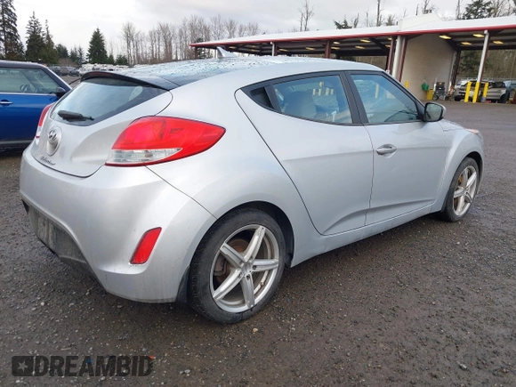2012 Hyundai Veloster w/Gray Int with VIN KMHTC6AD8CU063977, listed as a IAAI auction lot 41494419 with 192,179 mi miles and . Bid and sale history available at DreamBid. Image 4.