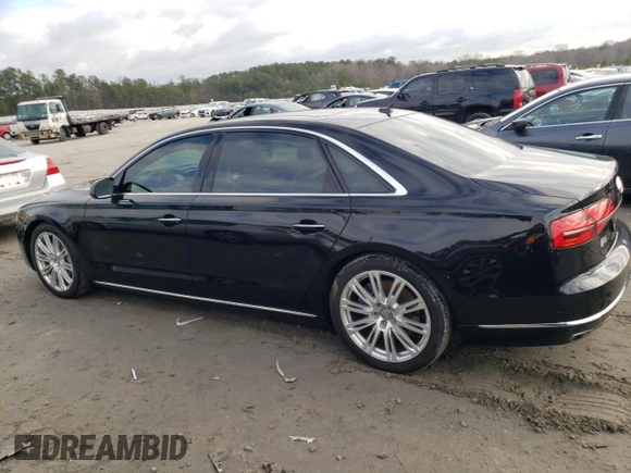2015 Audi A8 L 4.0T with VIN WAU32AFD7FN004904, listed as a Copart auction lot 38942883 with 80,205 mi miles. Bid and sale history available at carsss.com. Image 2.