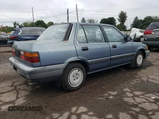 1987 Honda Civic z VIN 1HGEC4638HA016153, wystawiony jako Copart lot #73868274 z przebiegiem 22 876 mil mil oraz Tytuł czysty. Historia ofert i sprzedaży dostępna na DreamBid. Obrazek 3.