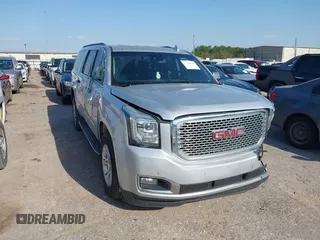 2016 GMC Yukon XL SLT z VIN 1GKS1GKC3GR268945, wystawiony jako IAAI lot #41864816 z przebiegiem 171 815 mil mil oraz . Historia ofert i sprzedaży dostępna na DreamBid. Obrazek 1.