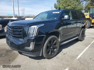 2015 Cadillac Escalade Premium with VIN 1GYS4NKJ4FR550767, listed as a Copart auction lot 45605755 with 121,862 mi miles and Salvage Title. Bid and sale history available at carsss.com. Image 1.
