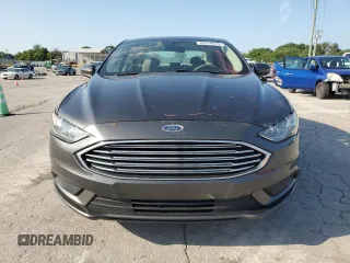 2017 Ford Fusion Hybrid SE с VIN 3FA6P0LU3HR287520, выставлен на аукционе Copart как лот 63519315 с пробегом 101 156 миль миль и Списание • Salvage title. История ставок и продаж доступна на DreamBid. Изображение 5.