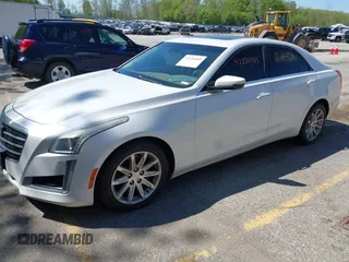 2015 Cadillac CTS Luxury AWD z VIN 1G6AX5SX5F0103725, wystawiony jako IAAI lot #42226485 z przebiegiem 112 437 mil mil oraz . Historia ofert i sprzedaży dostępna na DreamBid. Obrazek 2.