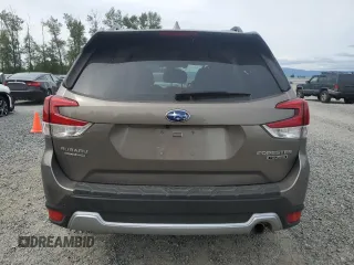 2021 Subaru Forester Touring z VIN JF2SKAXC0MH560263, wystawiony jako Copart lot #61453195 z przebiegiem Nie podano mil oraz Szkoda całkowita • Salvage title. Historia ofert i sprzedaży dostępna na DreamBid. Obrazek 6.