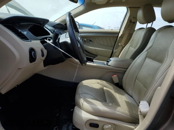 2015 Ford Taurus SEL with VIN 1FAHP2E82FG158662, listed as a Copart auction lot 58233875 with 159,174 mi miles and Salvage title. Bid and sale history available at DreamBid. Image 7.