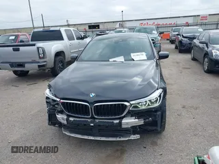 2019 BMW 6 Series 640i xDrive with VIN WBAJV6C50KBK08934, listed as a IAAI auction lot 41588796 with 61,411 mi miles and . Bid and sale history available at carsss.com. Image 12.