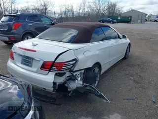 2014 Mercedes-Benz E-Class E 350 with VIN WDDKK5KF9EF241907, listed as a IAAI auction lot 42016399 with 84,650 mi miles. Bid and sale history available at carsss.com. Image 4.